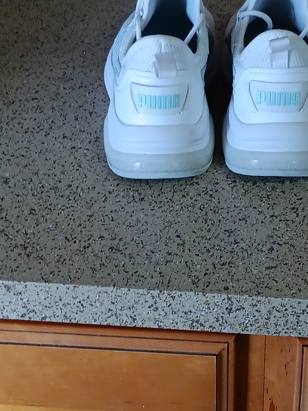 PUMA White Sneakers with Light Blue Logo